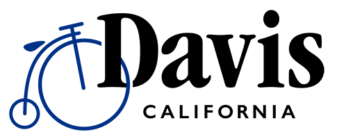 Black text that reads "Davis California" with a blue high wheel bike.